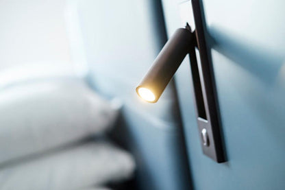 Embedded bedside table sconce