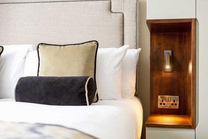 Embedded bedside table sconce