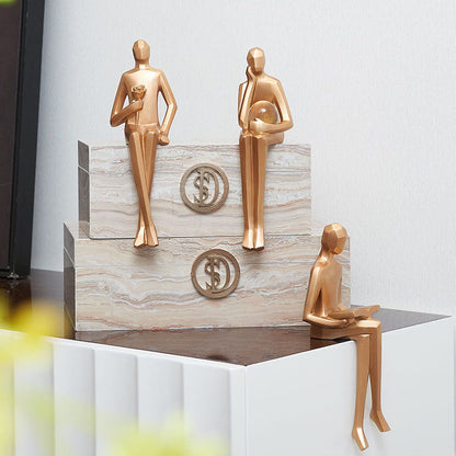 Golden Geometric Sitting Statue