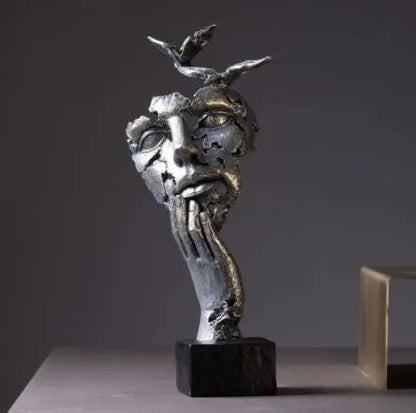 Handcrafted Face Sculptures