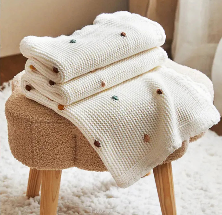 Nordic Pompom Baby Blanket: Cozy and Adorable