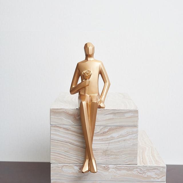 Golden Geometric Sitting Statue